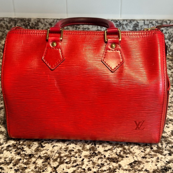 Louis Vuitton Handbags - Louis Vuitton Epi Speedy 25 in Castilian Red.